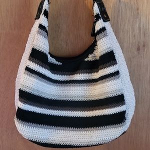 Brown and white stripped medium sized womans handbag